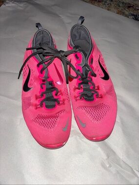Nike Women’s Pink Athletic Running Shoes with Gray Swoosh